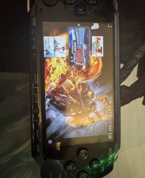 PSP 1000 modded with 57 games  للبيع